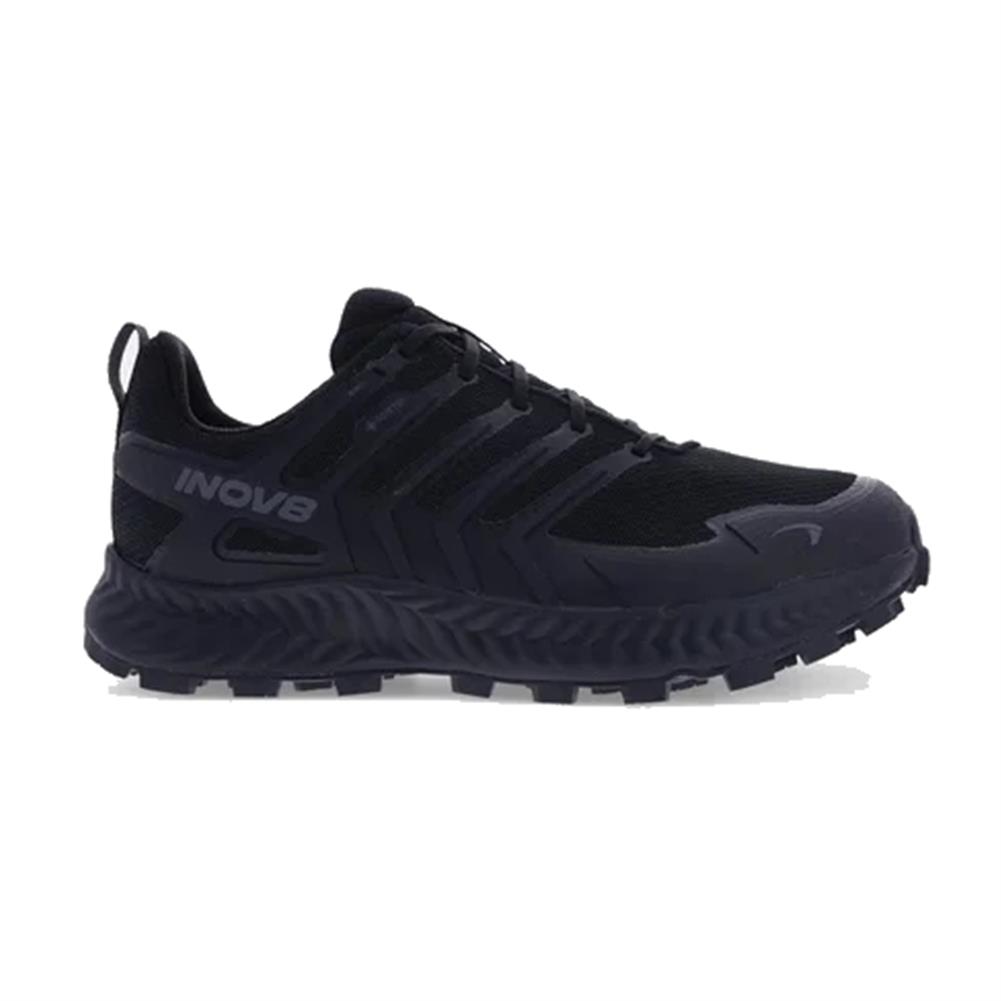 Side view on white background of Womens Inov8 Roclite GTX running shoe in Black/Dark Grey, Wide width