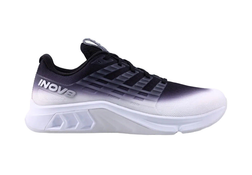 Side view on white background of Mens Inov8 F-Lite Max running shoe in White/Black, Wide width