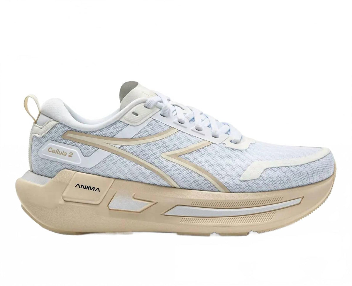 Side view on white background of Womens Diadora Cellula 2 running shoe in White/Whisper White, Medium (Regular) width