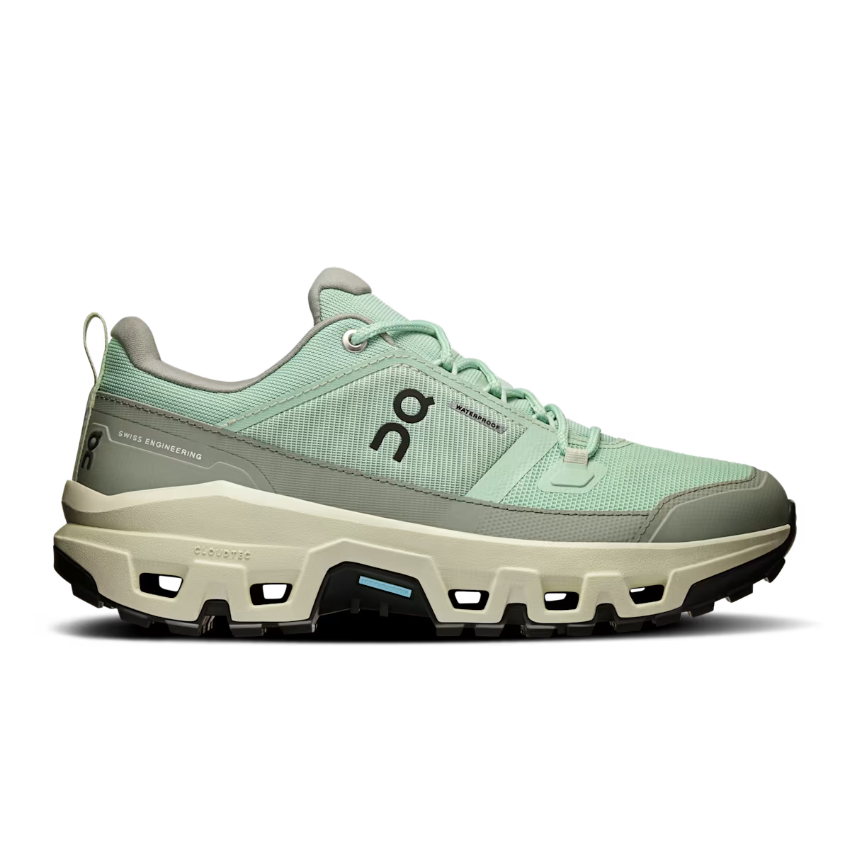 Side view on white background of Womens On Cloudrock Low Waterproof running shoe in Mineral/Aloe, Medium (Regular) width