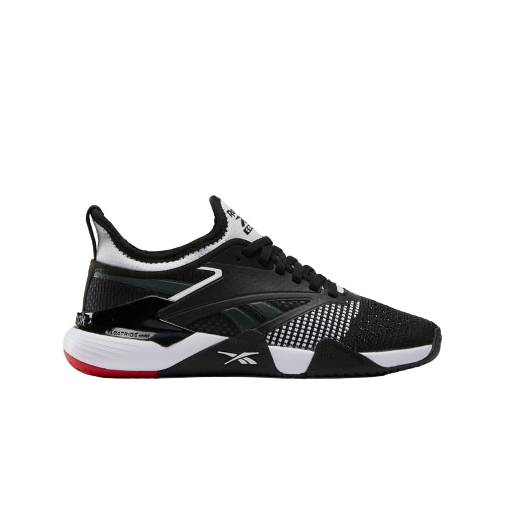 Side view on white background of Womens Reebok Nano Court running shoe in Black/Vector Red/White, Medium (Regular) width