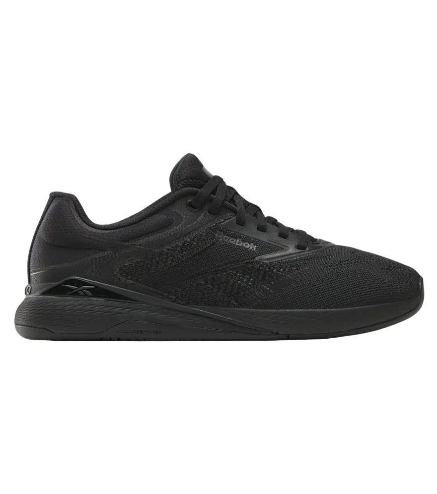 Side view on white background of Womens Reebok Nano X5 running shoe in Black/Grey 5, Medium (Regular) width