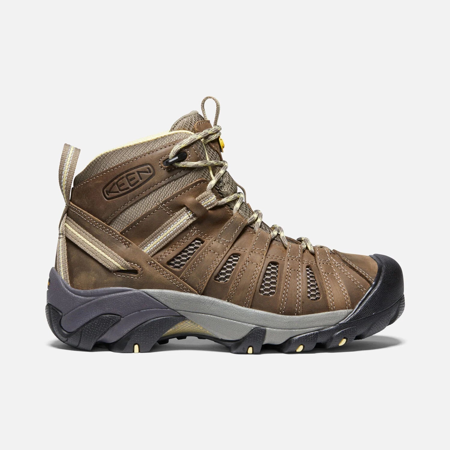 Side view on white background of Womens Keen Voyageur Mid running shoe in Brindle/Custard, Medium (Regular) width