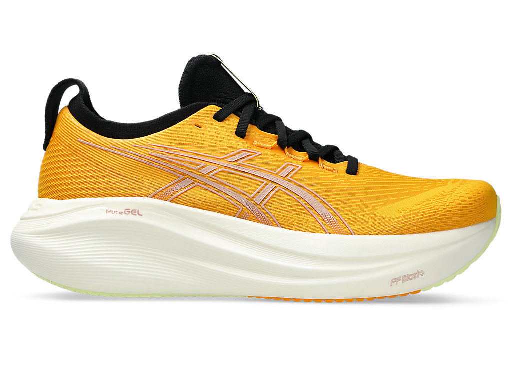 Side view on white background of Mens Asics Gel-Nimbus 27 running shoe in Amber/Neutral Pink, Medium (Regular) width