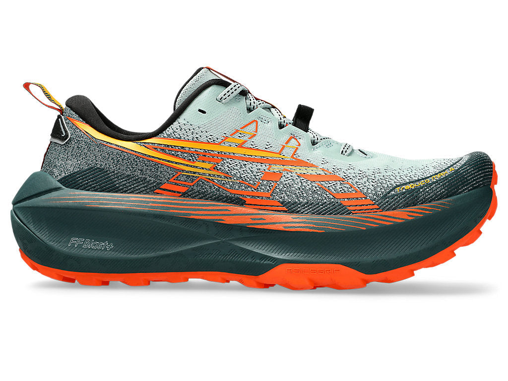 Side view on white background of Mens Asics Trabuco Max 4 running shoe in Cold Moss/Nova Orange, Medium (Regular) width