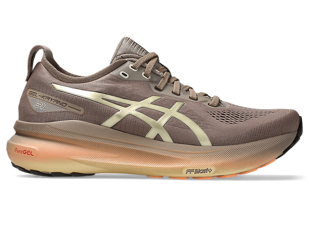 Side view on white background of Mens Asics Gel-Kayano 31 Luxe running shoe in Platinum/Taupe Grey, Medium (Regular) width