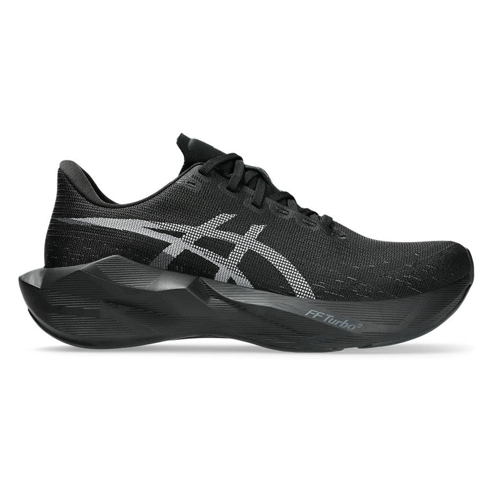Side view on white background of Mens Asics Novablast running shoe in Black/Black, Medium (Regular) width
