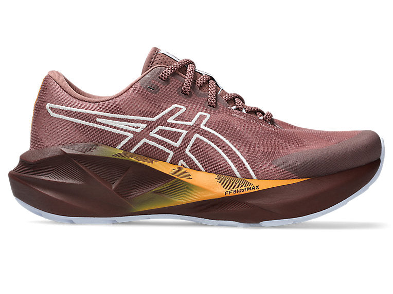 Side view on white background of Womens Asics Novablast 5 running shoe in Nature Bathing/Rubble Red, Medium (Regular) width