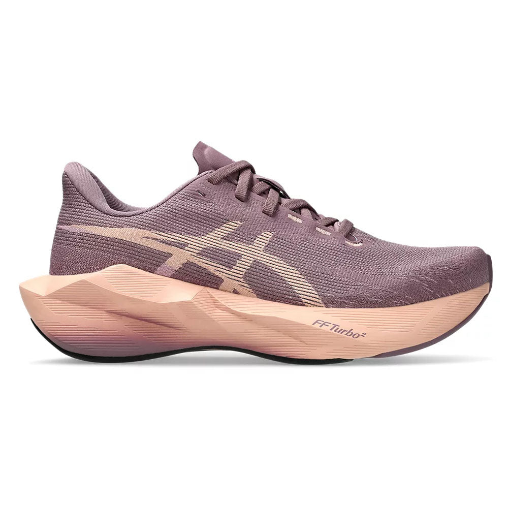 Side view on white background of Womens Asics Novablast running shoe in Dusty Mauve/Cantaloupe, Medium (Regular) width