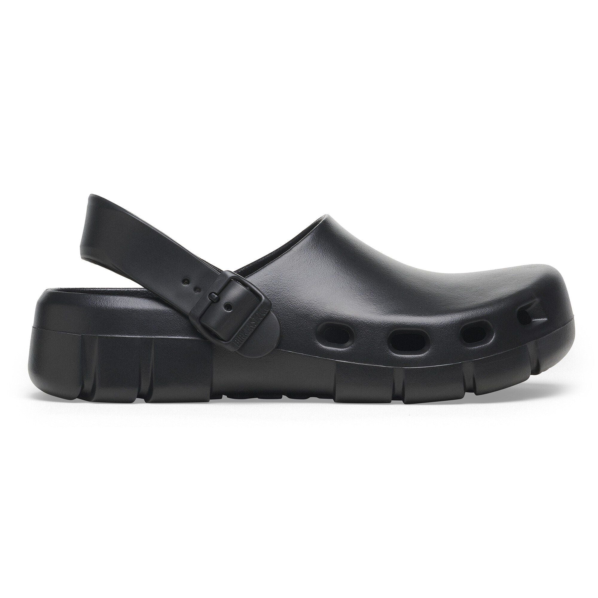 Side view on white background of Mens Birkenstock Birki Flow EVA running shoe in Black, Medium (Regular) width