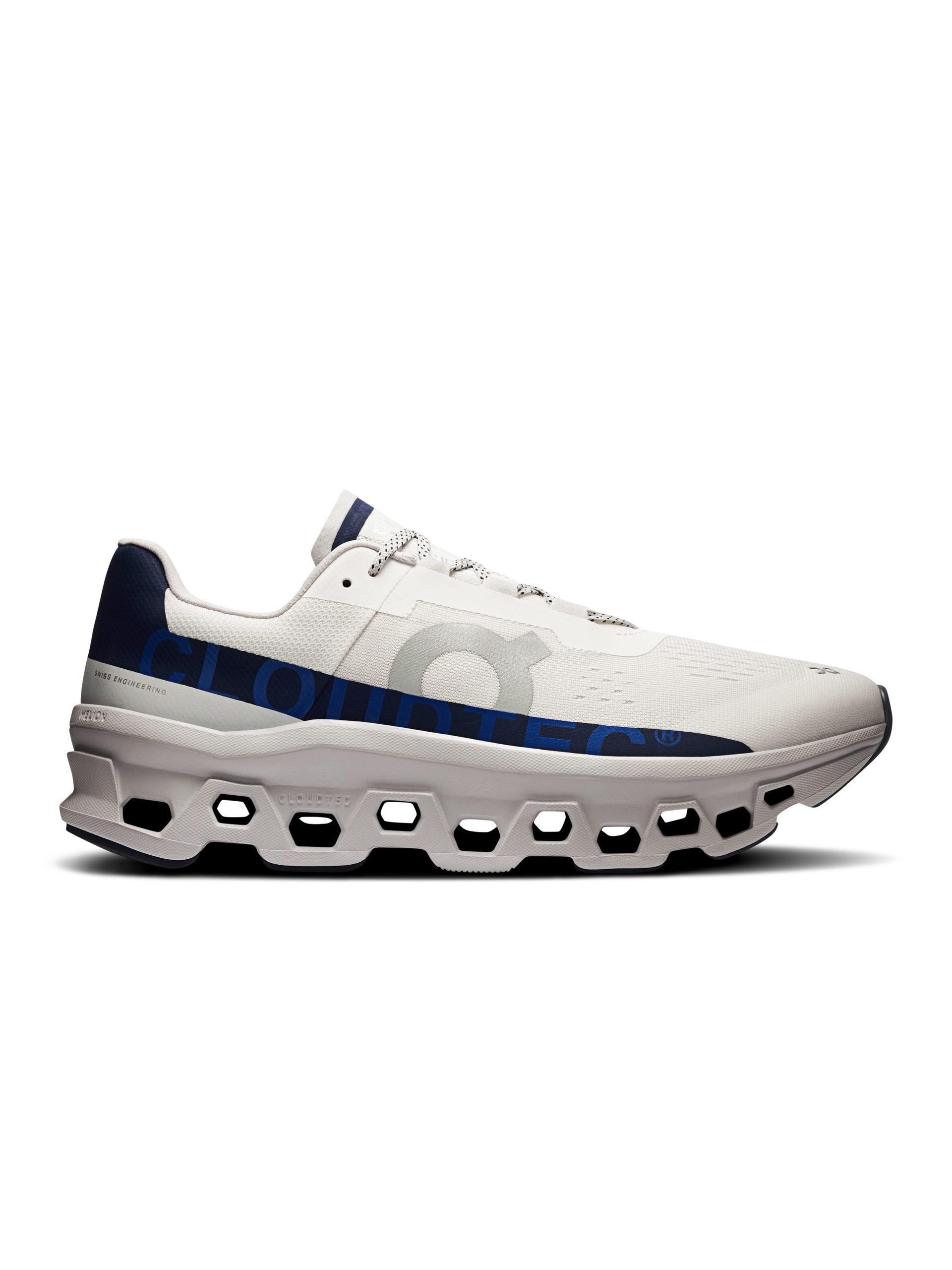 Side view on white background of Mens On Cloudmonster running shoe in Ivory/Midnight, Medium (Regular) width