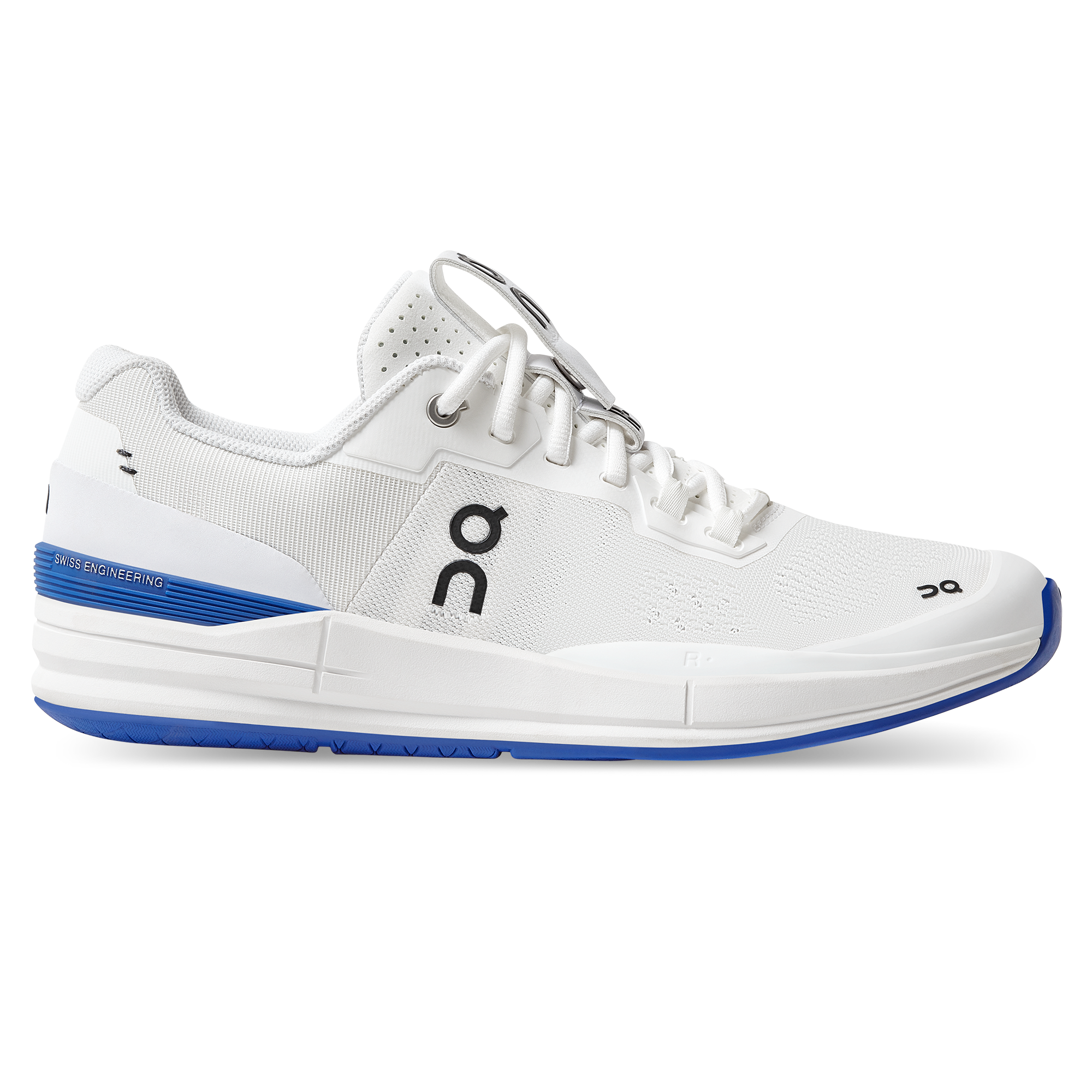 Side view on white background of Mens On The Roger Pro running shoe in White/Indigo, Medium (Regular) width