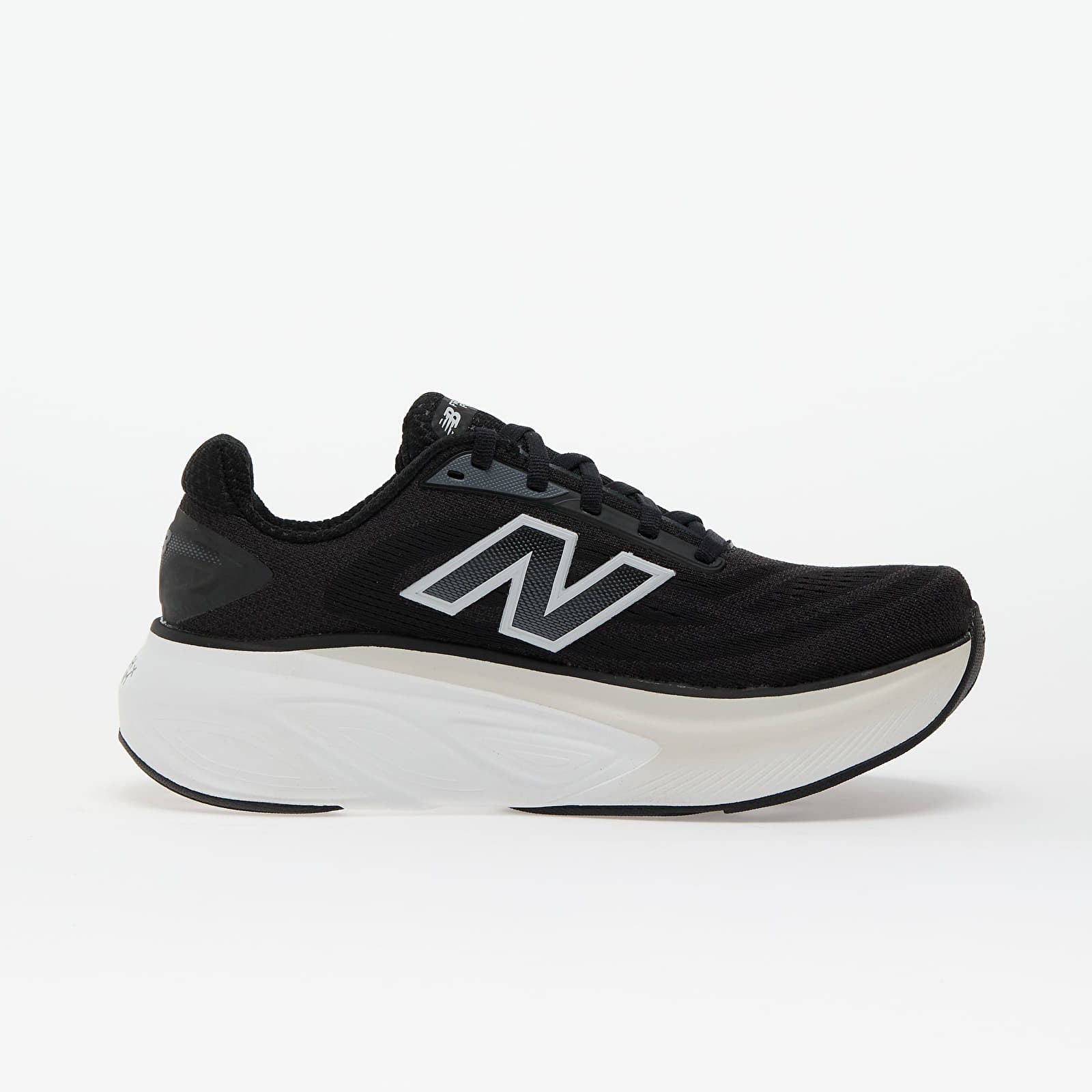 Side view on white background of Womens New Balance Fresh Foam X More v6 running shoe in Black/Grey Matter/Castlerock, Wide width