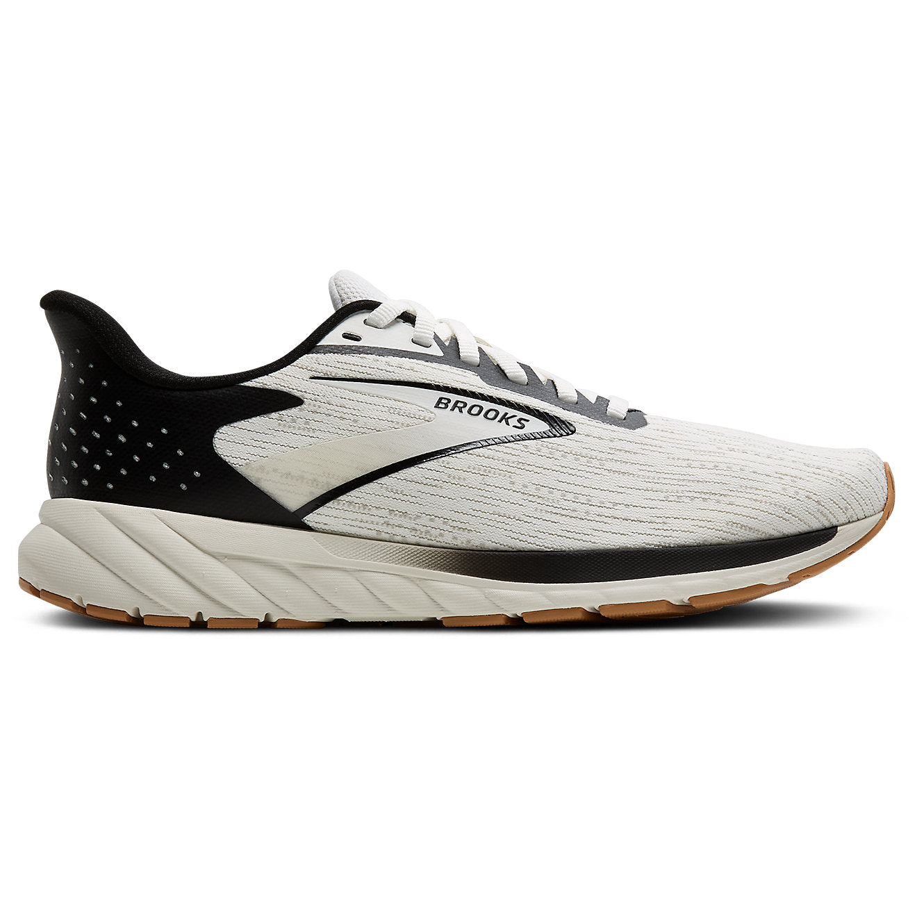 Side view on white background of Womens Brooks Anthem 7 running shoe in White/Black/Tan, Medium (Regular) width