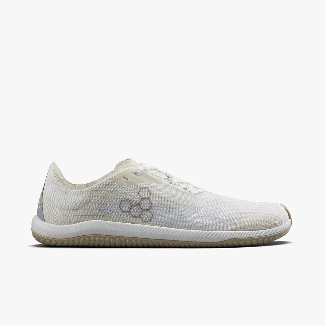 Side view on white background of Mens Vivobarefoot Primus Flow running shoe in Coconut, Medium (Regular) width