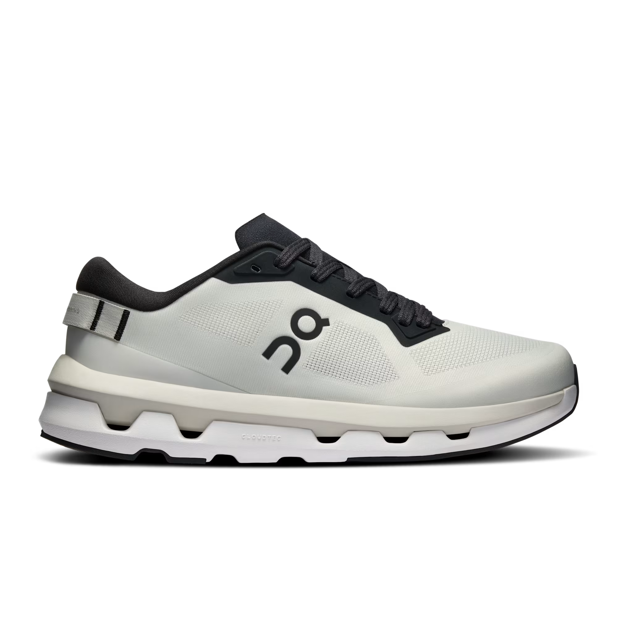 Side view on white background of Womens On Cloudzone running shoe in Ice/Black, Medium (Regular) width