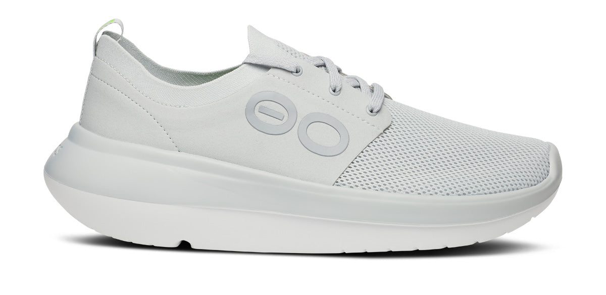 Side view on white background of Mens OOFOS OOmy Stride running shoe in Glacier, Medium (Regular) width