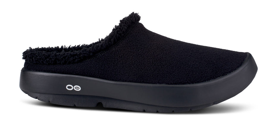 Side view on white background of Womens OOFOS OOcoozie Mule running shoe in Black, Medium (Regular) width