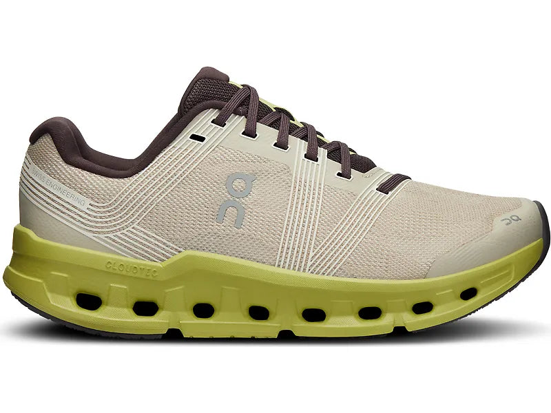 Side view on white background of Womens On Cloudgo running shoe in Sand/Zest, Medium (Regular) width