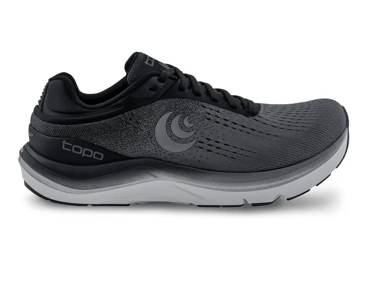 Side view on white background of Womens Topo Athletic Magnifly 5 running shoe in Charcoal/Black, Medium (Regular) width