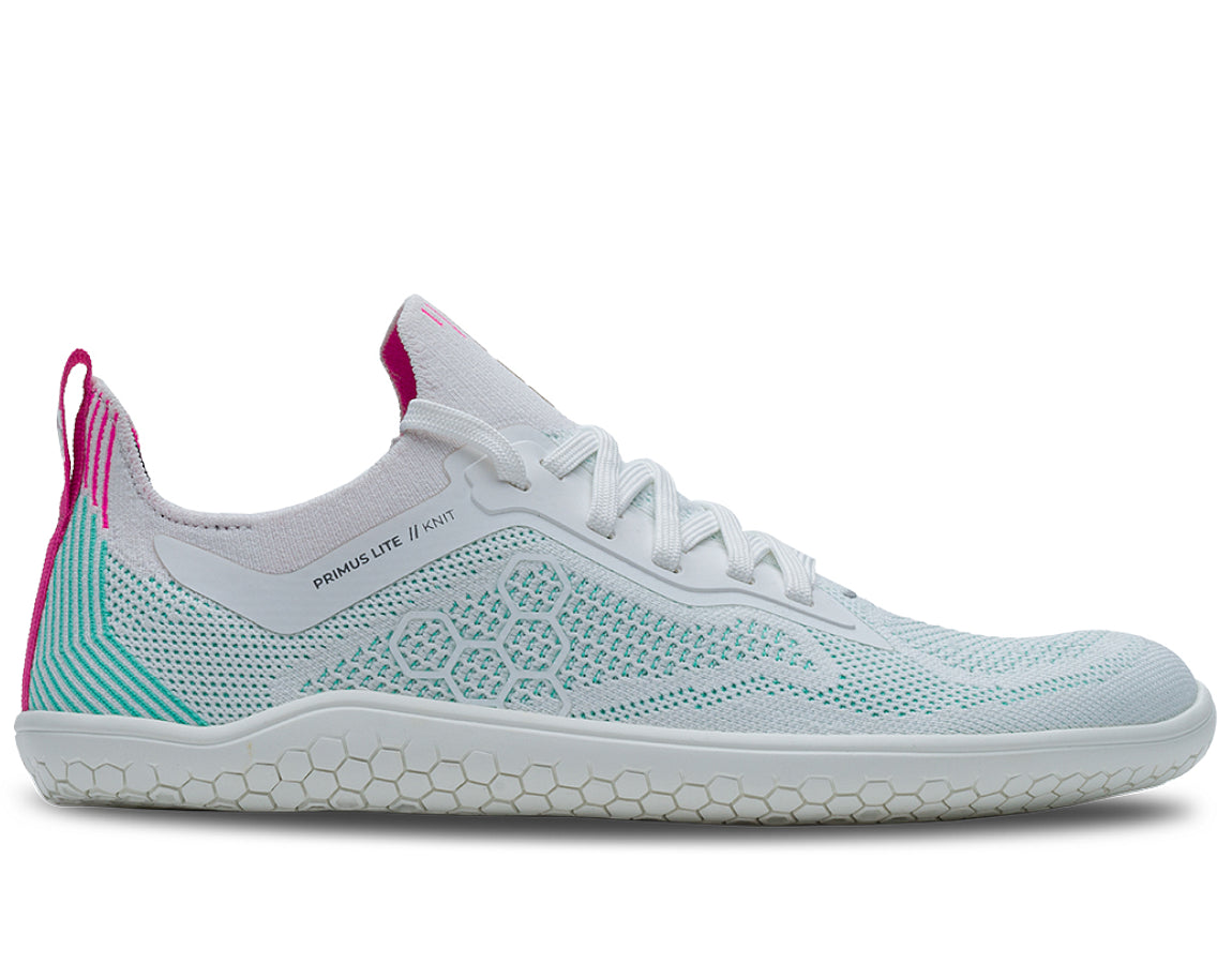 Side view on white background of Womens Vivobarefoot Primus Lite Knit running shoe in Blue Tint, Medium (Regular) width