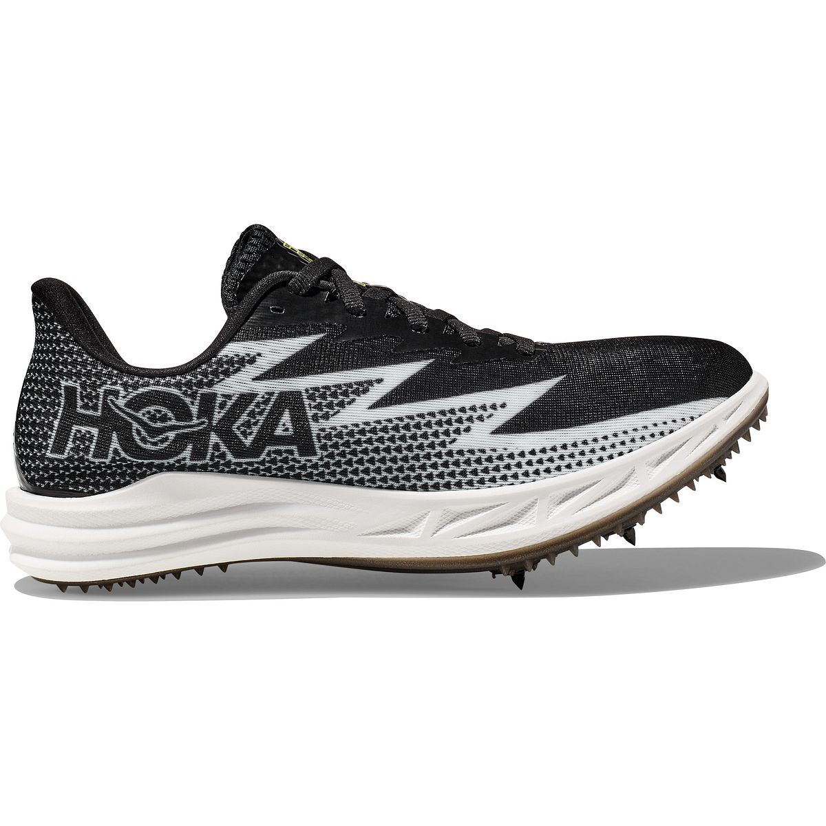 Side view on white background of Womens Hoka Crescendo MD running shoe in Black/White, Medium (Regular) width