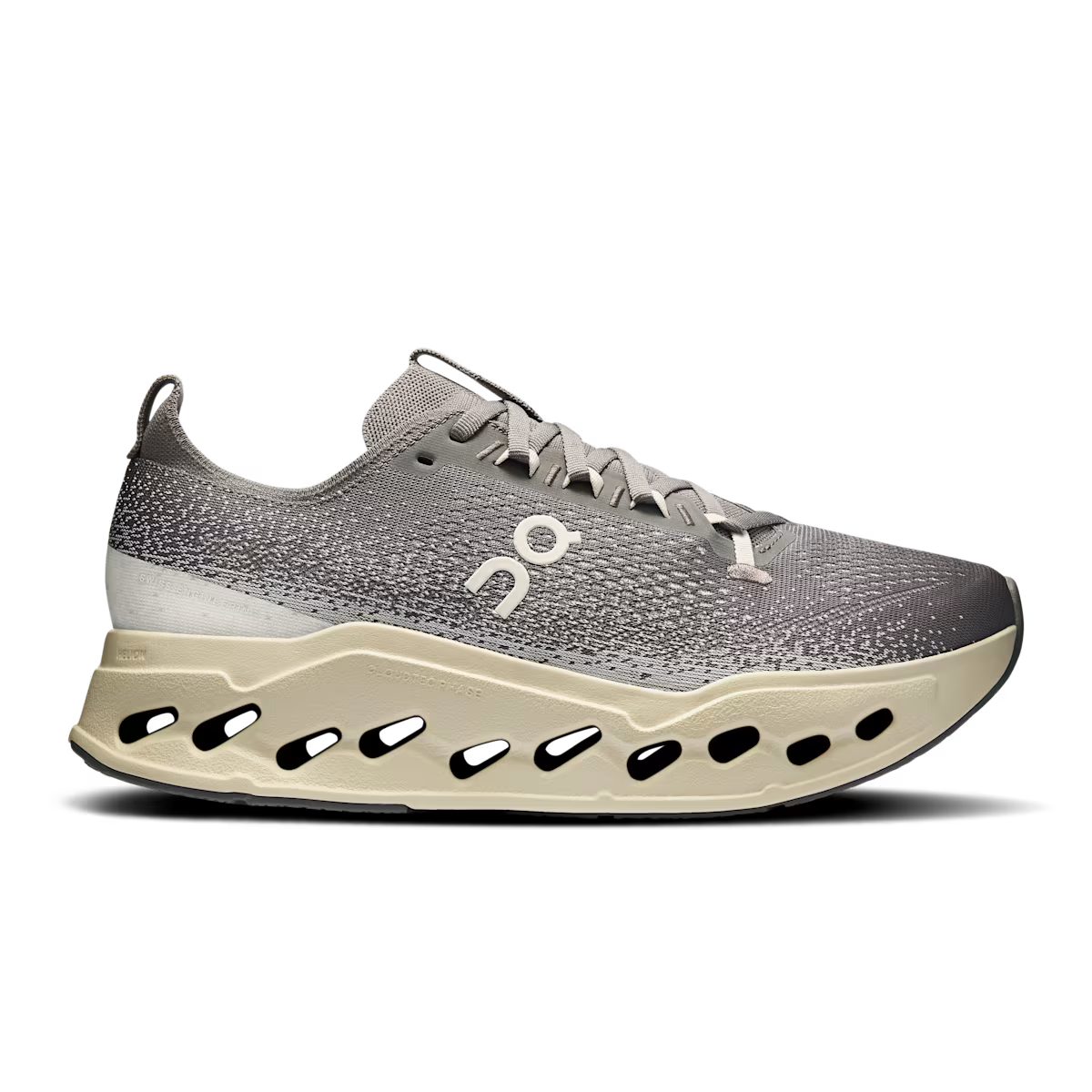 Side view on white background of Mens On Cloudsurfer Max running shoe in Asphalt/Ice, Medium (Regular) width