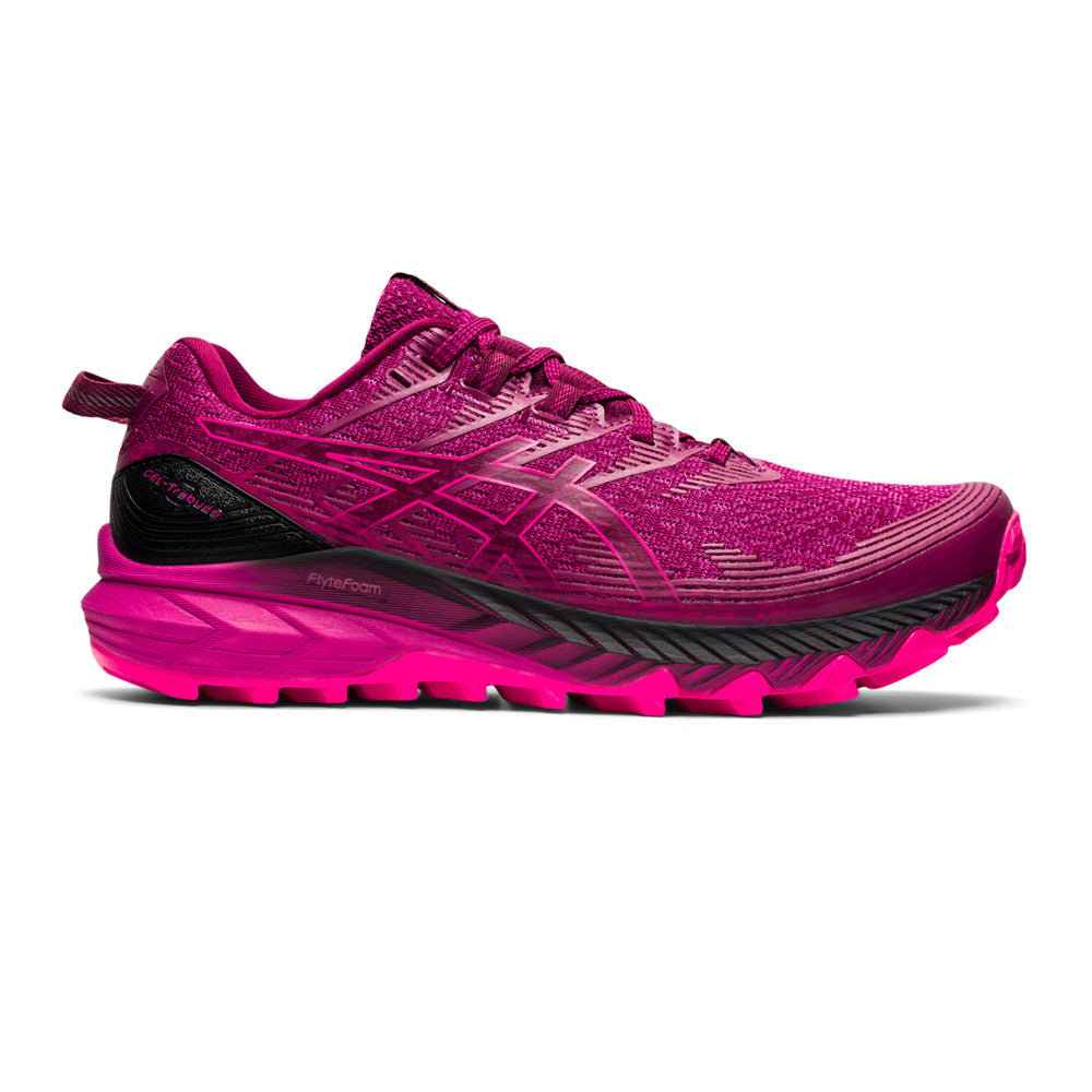 Side view on white background of Womens Asics Gel-Trabuco 10 running shoe in Dried Berry/Fuchsia Red, Medium (Regular) width