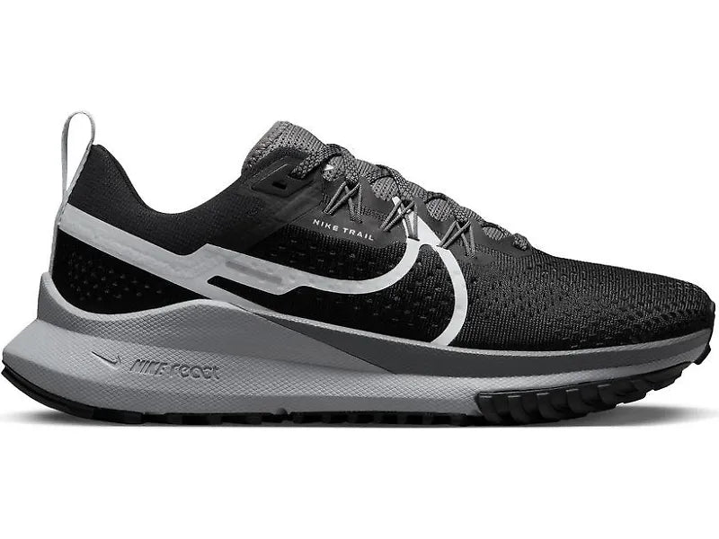Side view on white background of Womens Nike Pegasus Trail 4 running shoe in Black/Aura/Dark Grey/Wolf Grey, Medium (Regular) width
