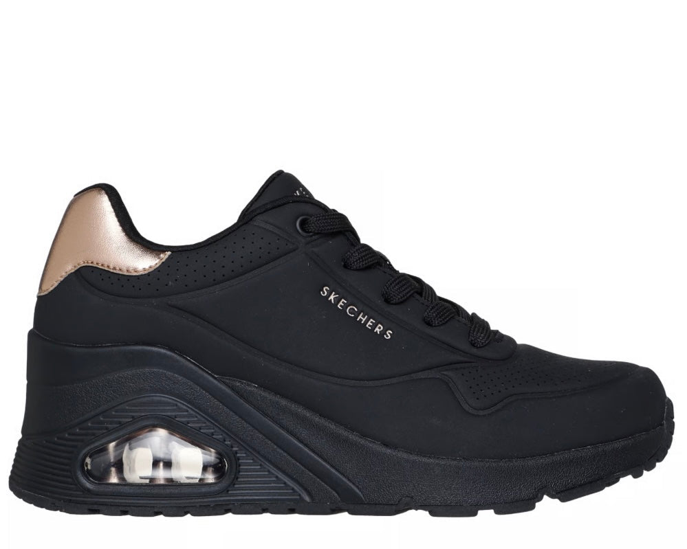 Side view on white background of Womens Skechers Uno Wedge Hi Steps running shoe in Black, Medium (Regular) width
