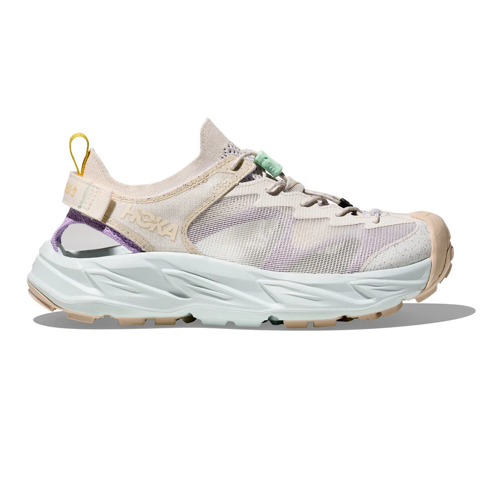 Side view on white background of Womens Hoka Hopara 2 running shoe in Alabaster/Snow Melt, Medium (Regular) width