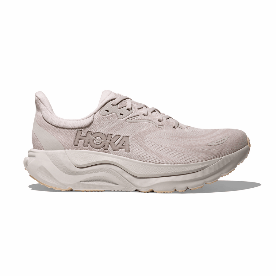 Side view on white background of Mens Hoka Arahi 8 running shoe in Grout/Putty, Wide width