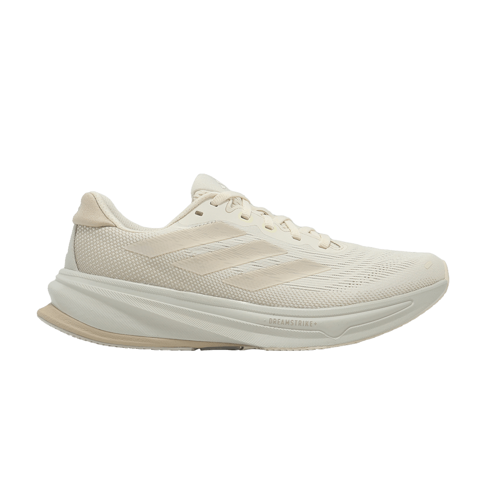 Side view on white background of Womens Adidas Supernova Rise 2 running shoe in Wonder White/Wonder White/Wonder Beige, Medium (Regular) width