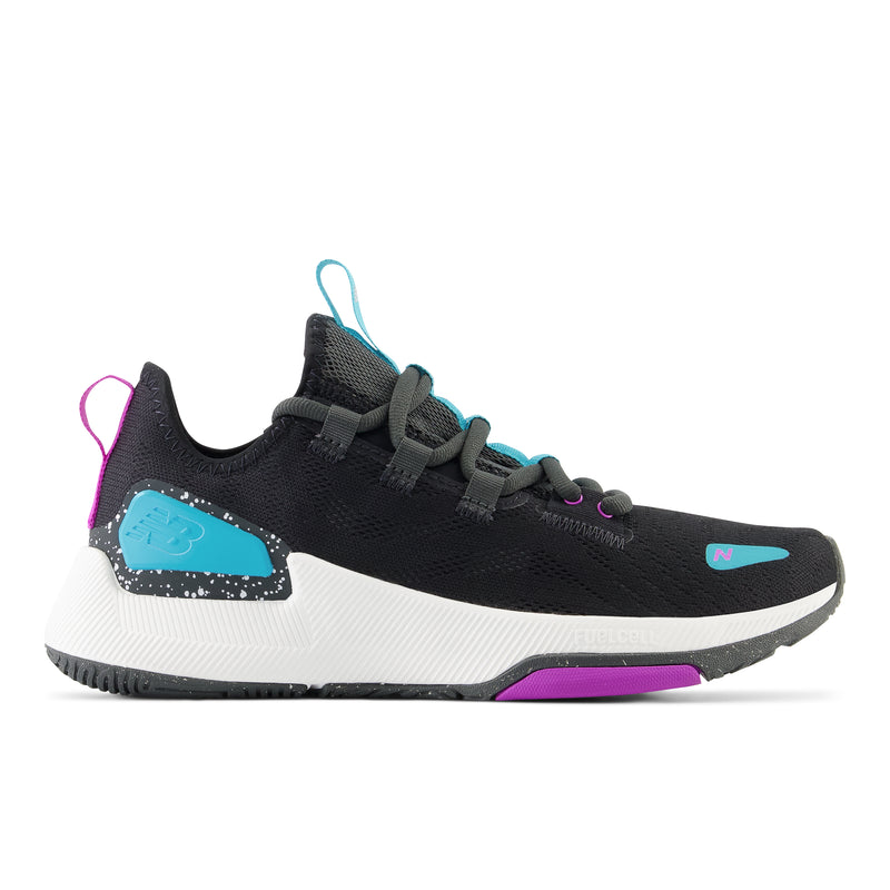 Side view on white background of Womens New Balance FuelCell Trainer v2 running shoe in Black/Virtual Blue/Cosmic Rose, Medium (Regular) width