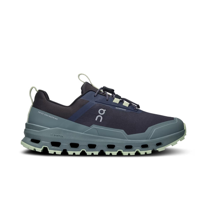 Side view on white background of Youth On shoe in Iron/Sea, Medium (Regular) width