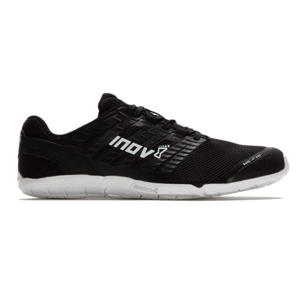 Side view on white background of Womens Inov8 Bare-XF 210 V3 running shoe in Black/White, Medium (Regular) width
