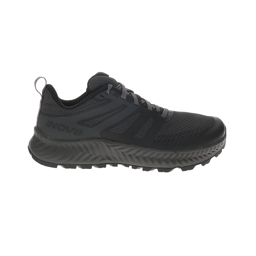 Side view on white background of Womens Inov8 TrailFly running shoe in Black, Medium (Regular) width