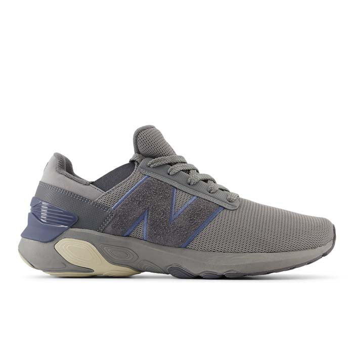 Side view on white background of Mens New Balance Fresh Foam X 1440 running shoe in Shadow Grey/Castlerock/Vintage Indigo, Wide width
