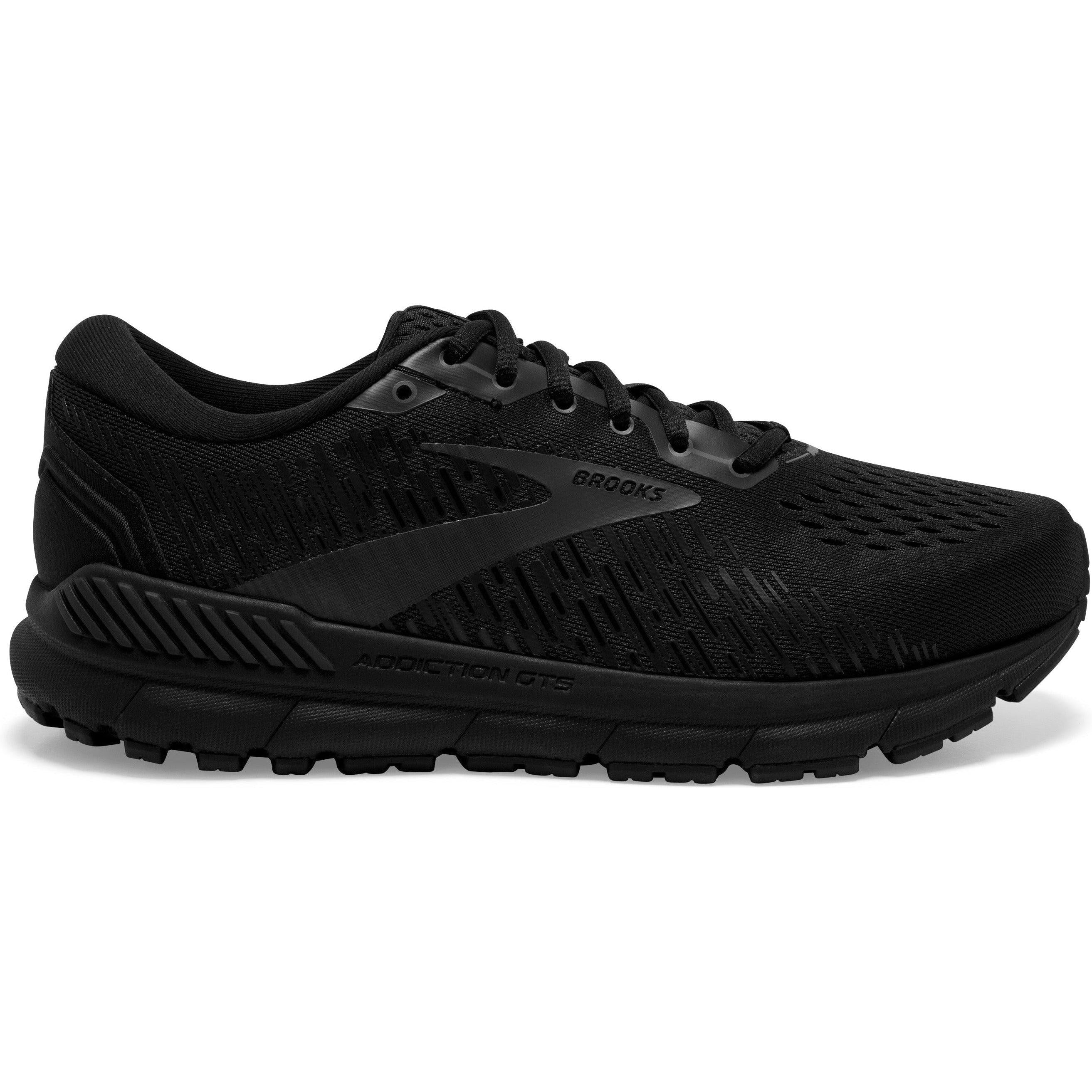 Side view on white background of Mens Brooks Addiction running shoe in Black/Black/Ebony, Narrow width