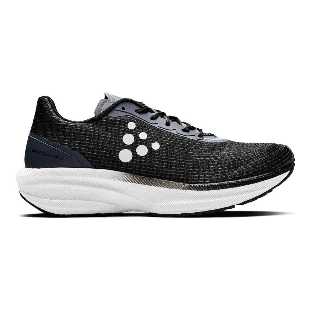 Side view on white background of Mens Craft Pro Endur running shoe in Black-White, Medium (Regular) width