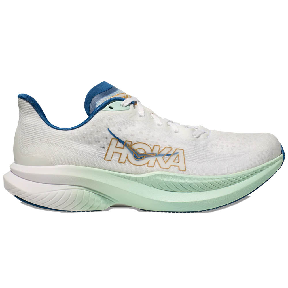 Side view on white background of Mens Hoka Mach running shoe in Frost/Gold, Medium (Regular) width