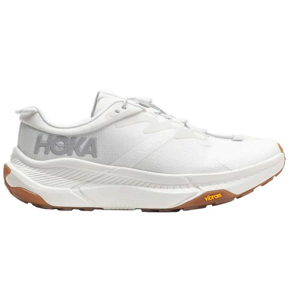 Side view on white background of Mens Hoka Transport running shoe in White/White, Medium (Regular) width