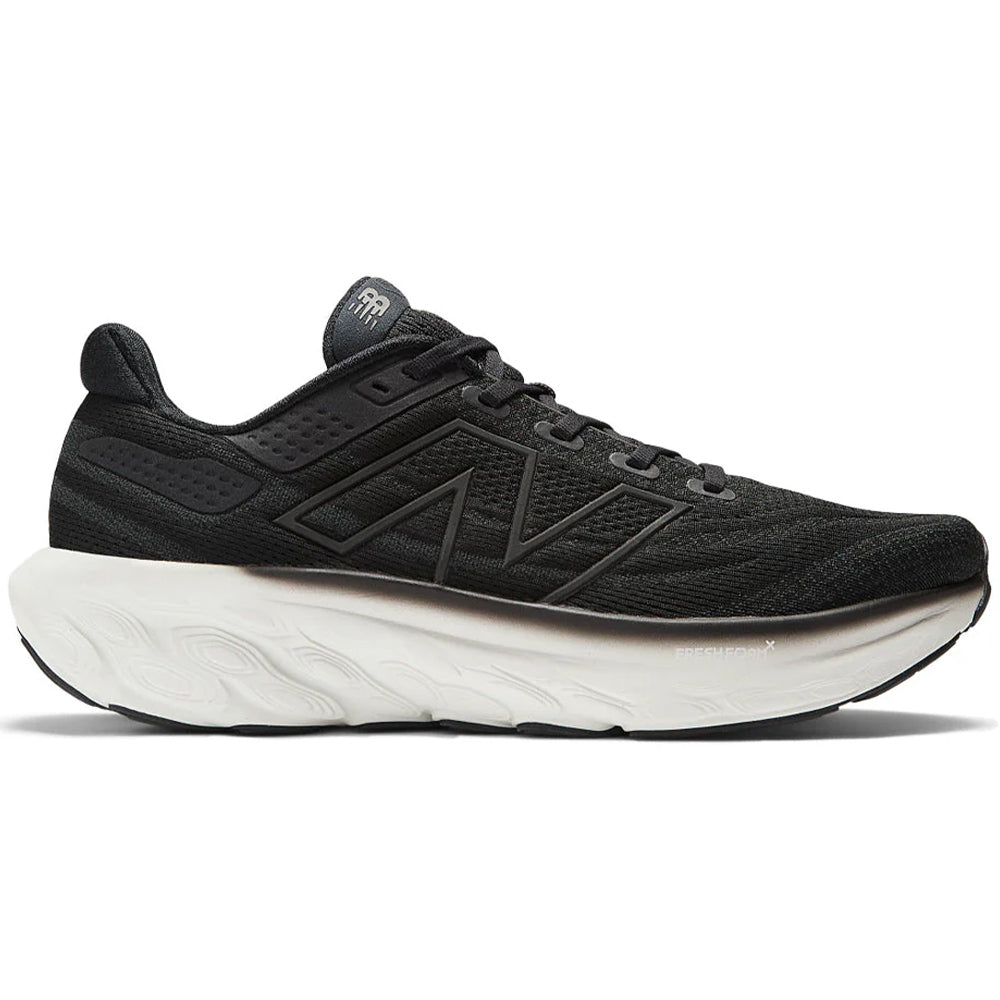 Side view on white background of Mens New Balance Fresh Foam X 1080 running shoe in Black/White, Medium (Regular) width