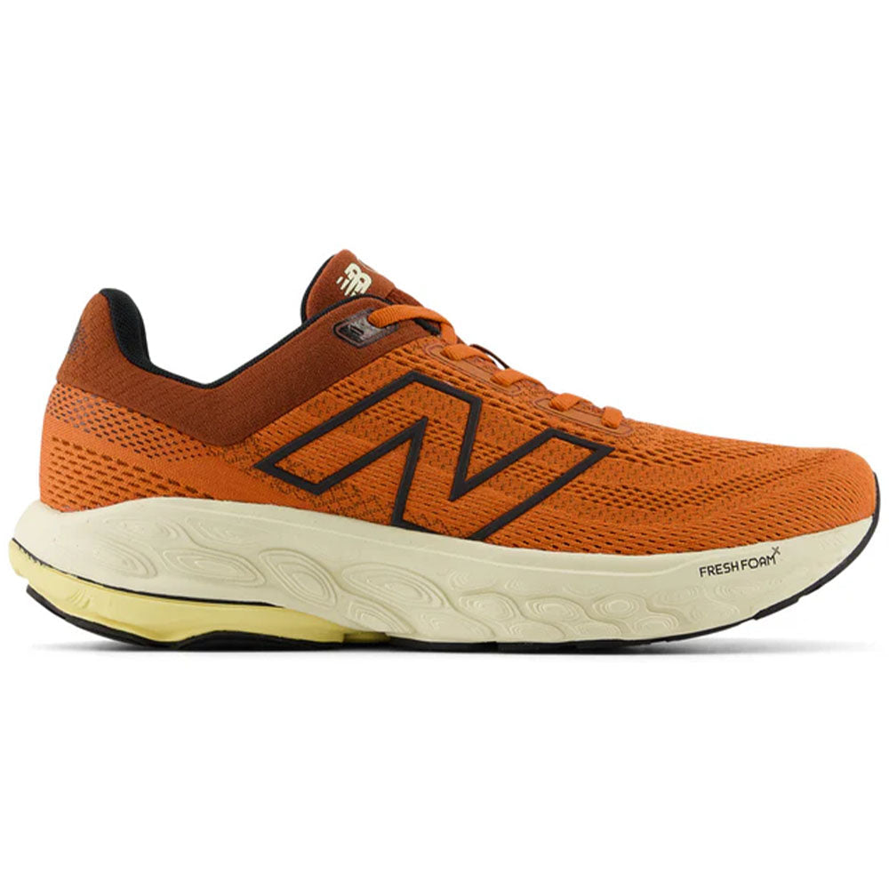 Side view on white background of Mens New Balance Fresh Foam 860 running shoe in Infield Clay/Relic Brown/Black, Wide width