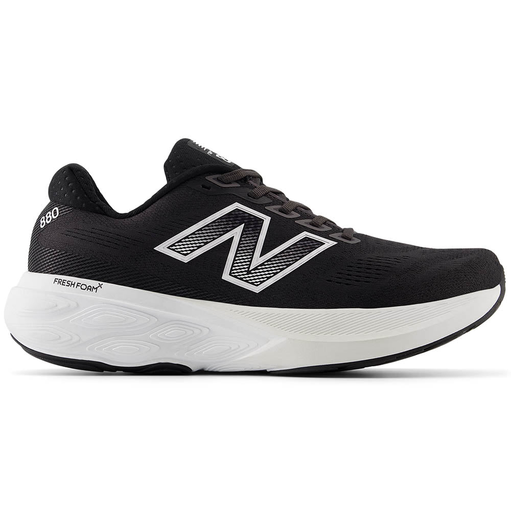 Side view on white background of Mens New Balance Fresh Foam 880 running shoe in Black/White/Reflection, Wide width