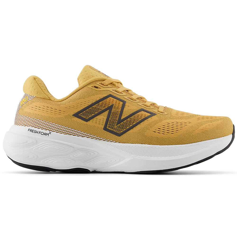 Side view on white background of Mens New Balance Fresh Foam X 880v15 running shoe in Dried Apricot/White/Marmalade, Wide width
