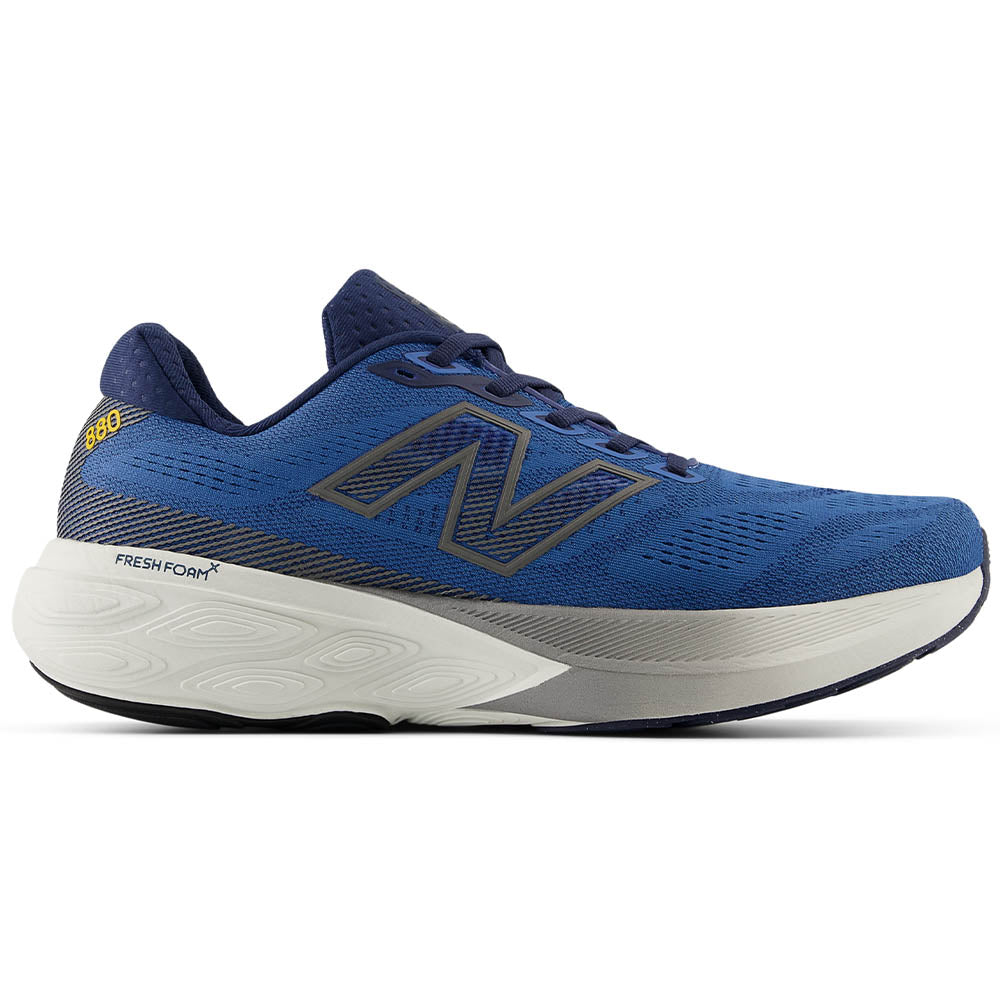 Side view on white background of Mens New Balance Fresh Foam 880 running shoe in Sea Stone/NB Navy/Marmalade, Extra Wide width