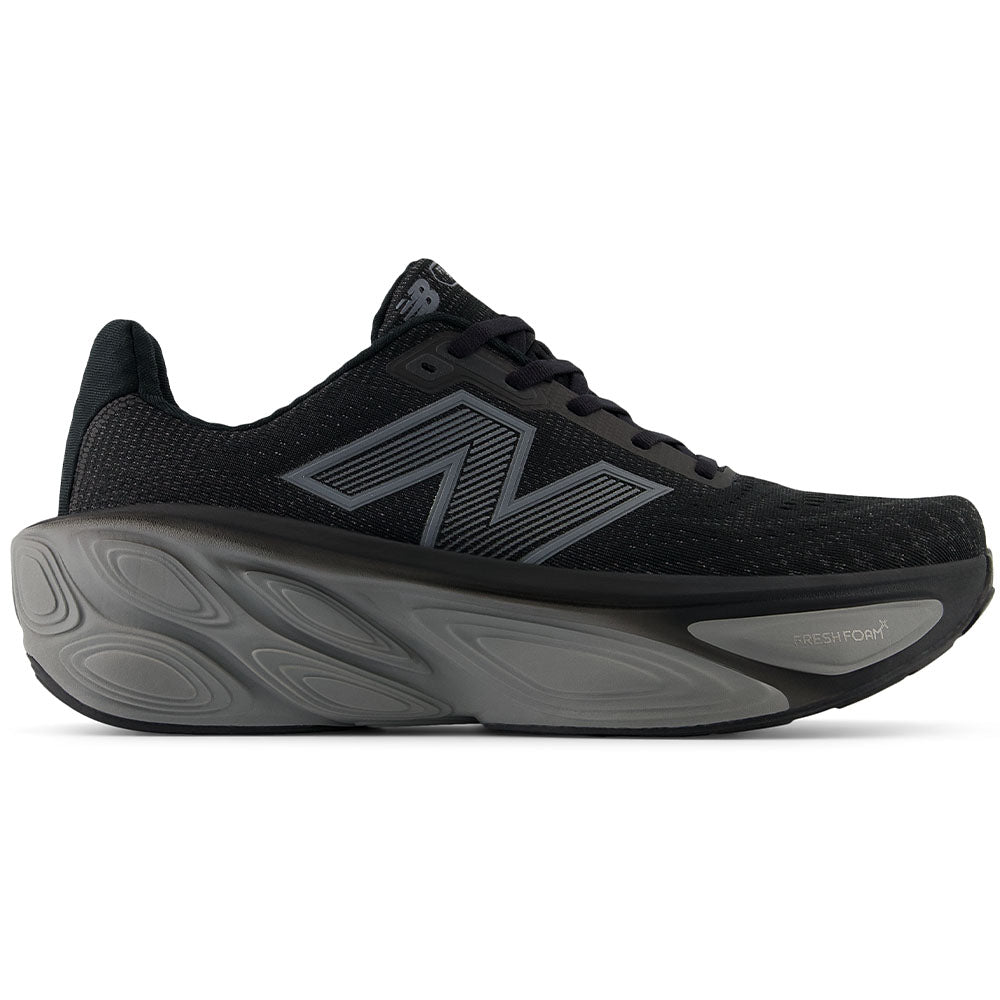 Side view on white background of Mens New Balance Fresh Foam X More running shoe in Black/Linen/Silver Metallic, Medium (Regular) width