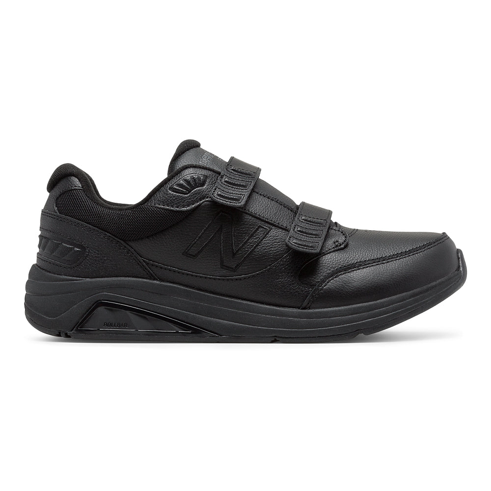 Side view on white background of Mens New Balance 928 running shoe in Black, Medium (Regular) width