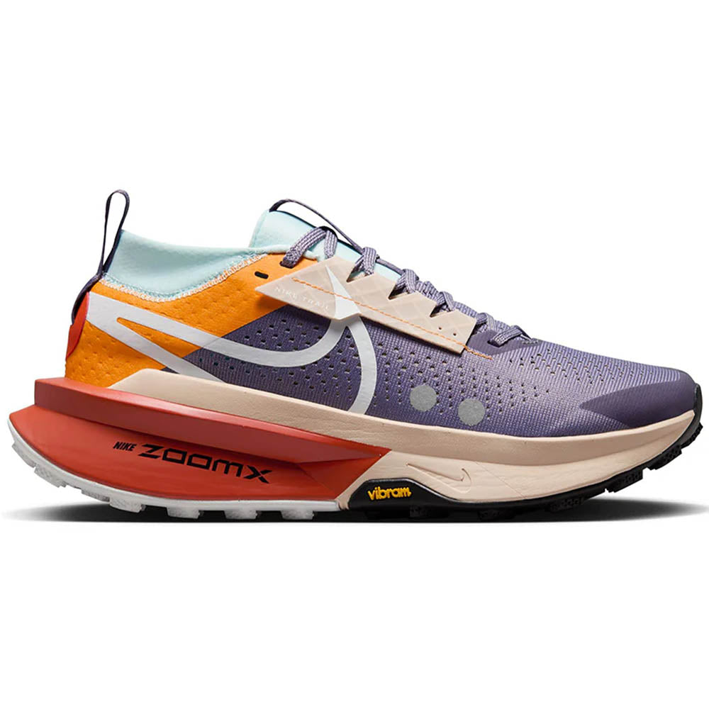 Side view on white background of Womens Nike ZoomX Zegama running shoe in Daybreak/White/Cosmic Clay/Sundial, Medium (Regular) width